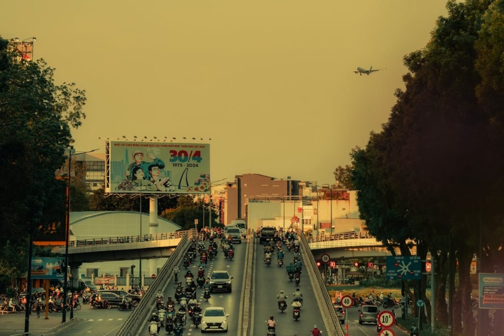 cars-and-motor-scooters-on-highways-during-rush-hour-23230602 Cars and Motor Scooters on Highways During Rush Hour